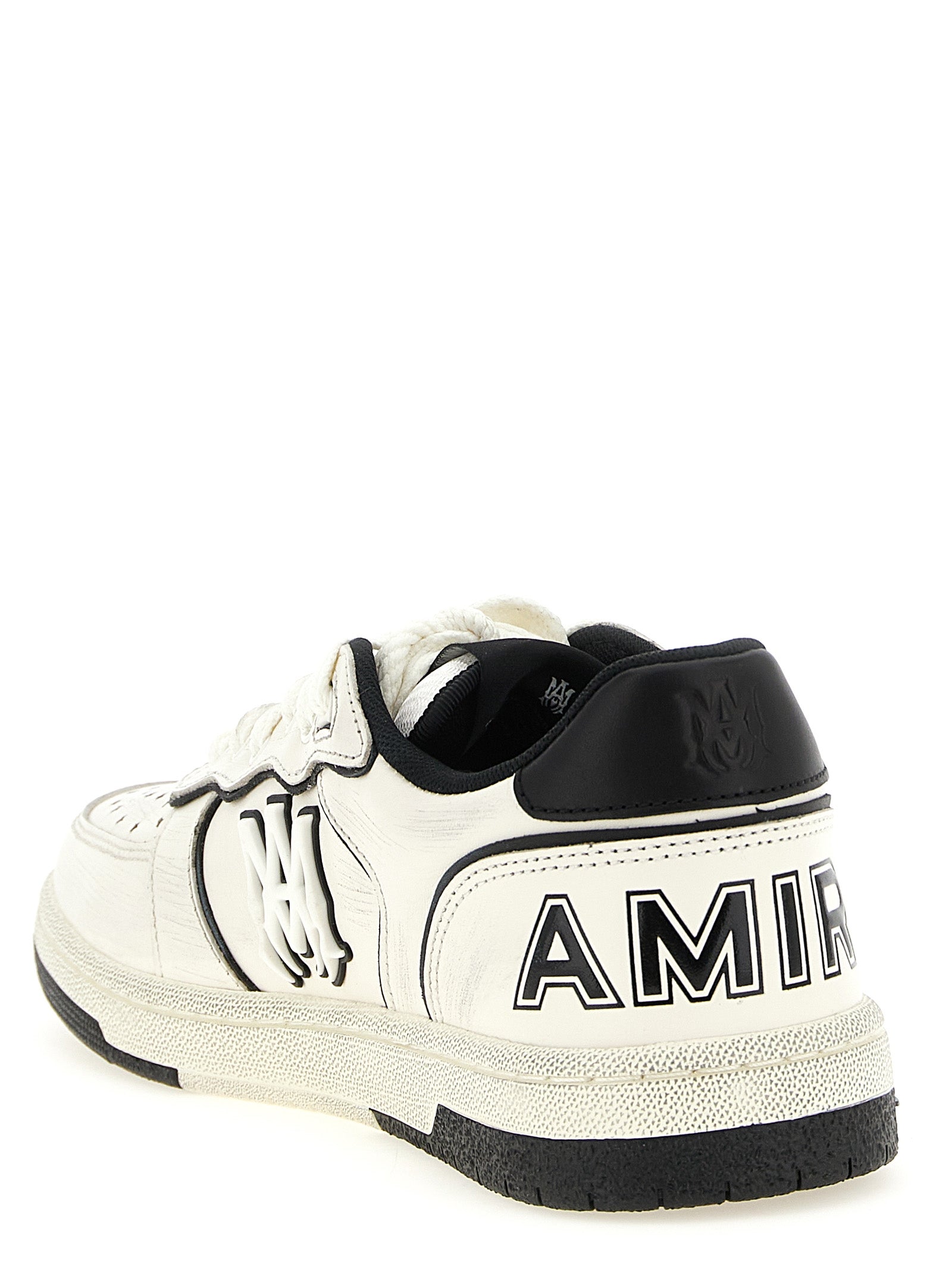 Sneakers by Amiri for men in modacrylic leather bicolour, black, white & print presents a on trend silhouette from the Men's Low Top Modacrylic Leather Sneakers collection, showcasing a on trend low-top style for an elevated aesthetic.