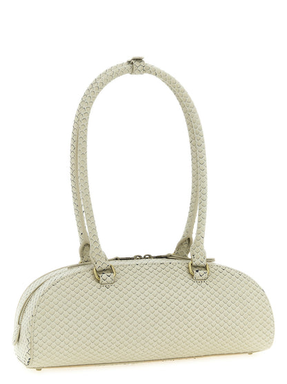 Shoulder Dome Bag by Diesel for women in leather & metal beige presents a statuesque silhouette, showcasing a secure zipper and statuesque with versatile shoulder-strap & handle for a sophisticated look.