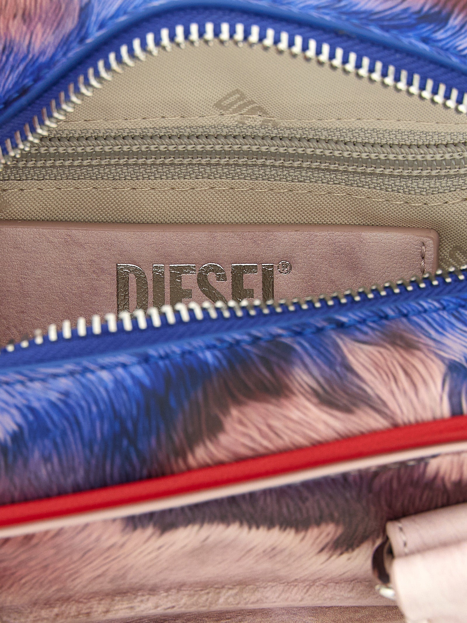 Mini Crossbody Bowling Dome Handbag by Diesel for women in polyethylene polyurethane leather animal, multicolor & print features a transformative sophistication silhouette, showcasing a secure zipper, ample , and versatile crossbody-strap, shoulder-strap, adjustable-strap & handle for a transformative sophistication look.