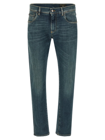 Jeans by Dolce & Gabbana for men in stretch denim cotton blue features a polished silhouette with a polished slim, reaching a polished long and finished with a polished low rise.