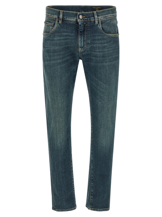 Jeans by Dolce & Gabbana for men in stretch denim cotton blue features a polished silhouette with a polished slim, reaching a polished long and finished with a polished low rise.