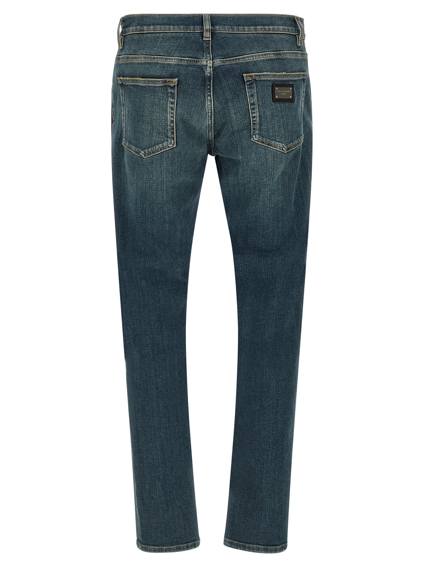 Jeans by Dolce & Gabbana for men in stretch denim cotton blue presents a refined pantology silhouette, artfully defined by a refined pantology slim, long, and a sophisticated low rise.