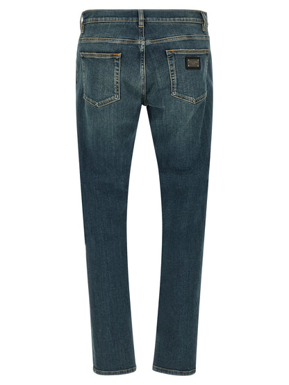 Jeans by Dolce & Gabbana for men in stretch denim cotton blue presents a refined pantology silhouette, artfully defined by a refined pantology slim, long, and a sophisticated low rise.