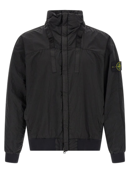 Hooded Bomber Jacket by Stone Island for men in nylon black features a dramatic silhouette, showcasing a sophisticated hooded neckline and distinctive pockets & hooded for a dramatic aesthetic.