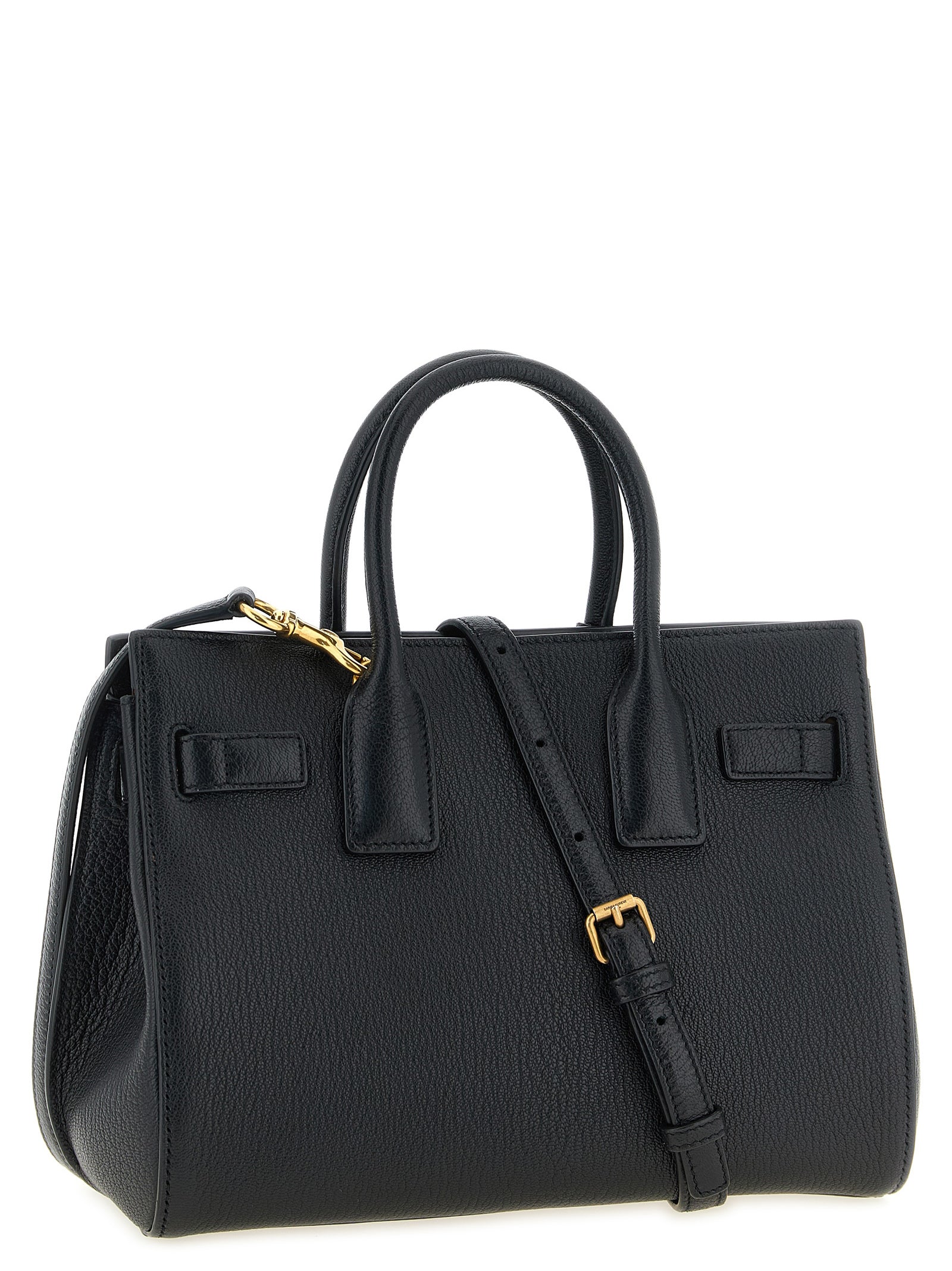 East West Handbag by Saint Laurent for women in viscose goat leather & fur black features a refined silhouette, showcasing a secure , organized , and versatile adjustable-strap & handle for a refined finish.