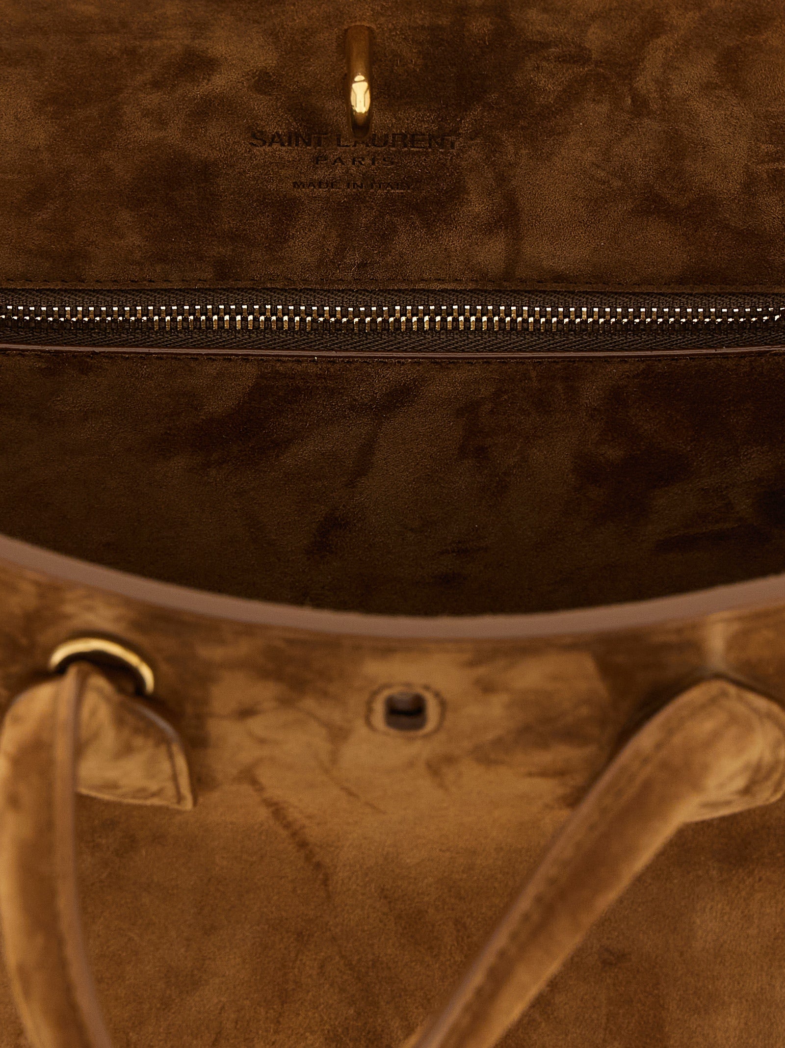 Small East West Handbag by Saint Laurent for women in suede calfskin leather brown & signature features a refined silhouette, showcasing a secure , organized , and versatile adjustable-strap & handle for a refined finish.