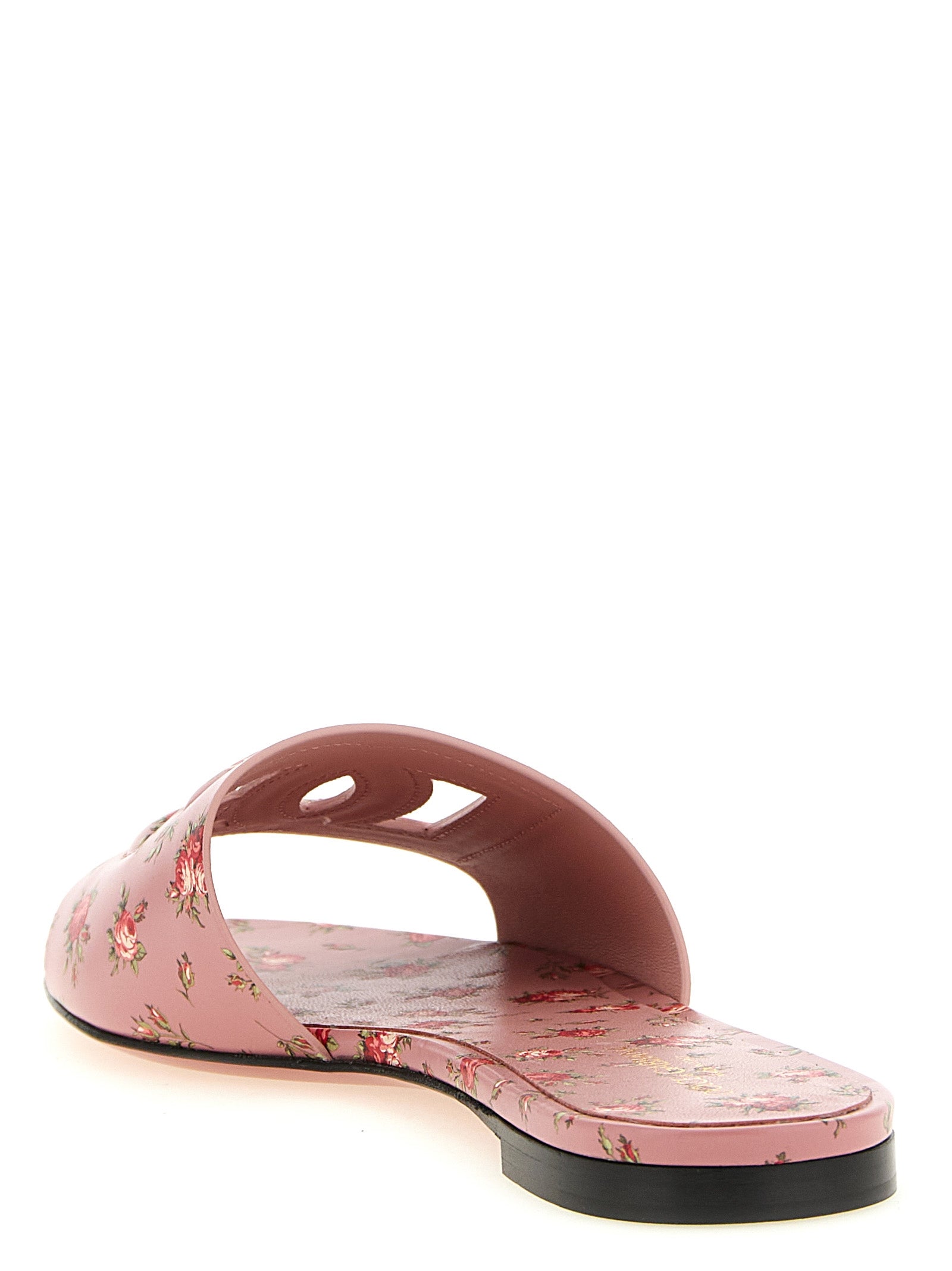 Sliders Flat Shoes by Dolce & Gabbana for women in tu & bos taurus calfskin leather multicolor, pink, rose & print features an captivating silhouette, showcasing the captivating style of the Women's TU & Bos Taurus Calfskin Leather Sliders Flat Shoes with its distinct and refined .