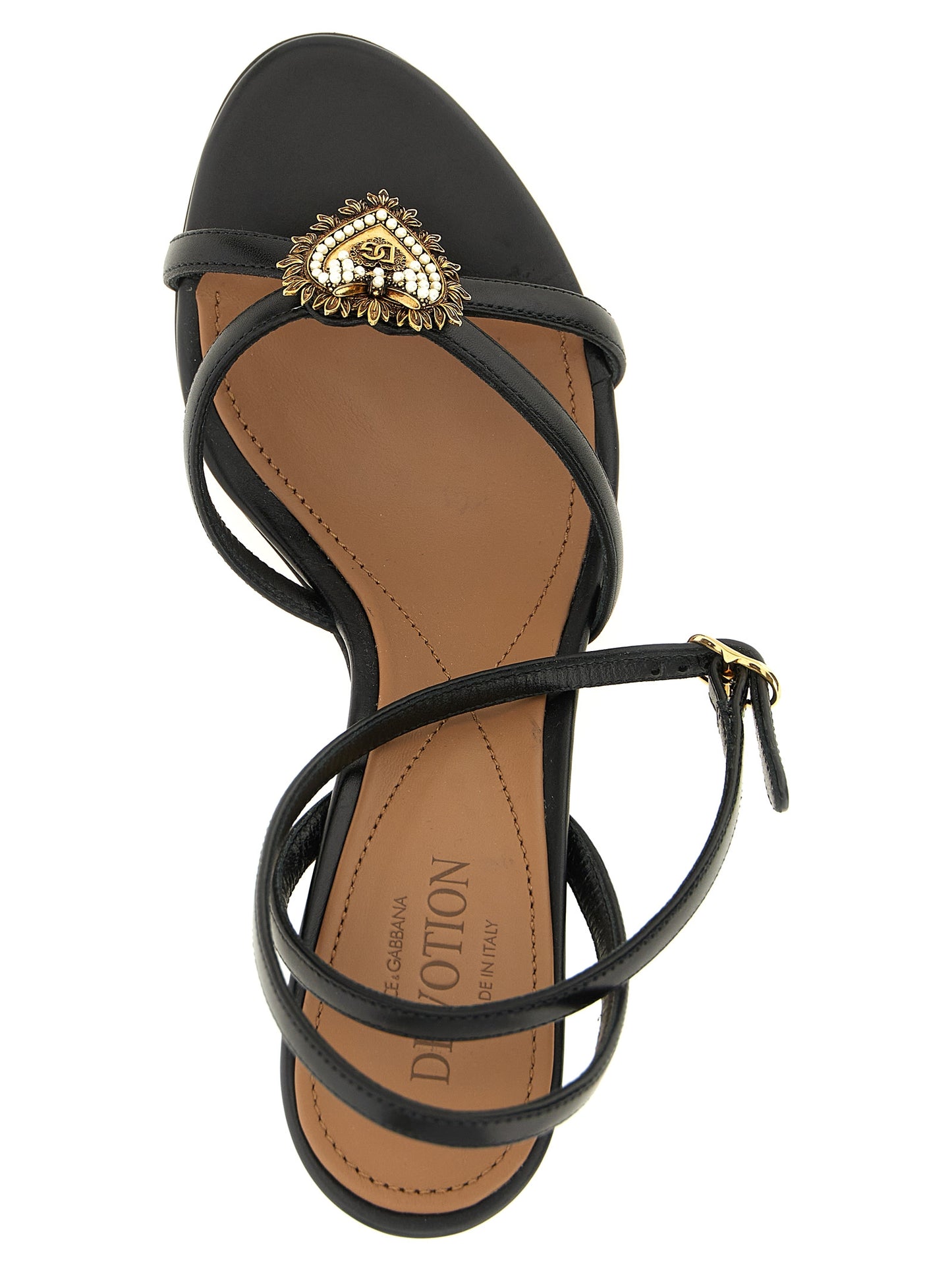 Stiletto Ankle Strap Sandals by Dolce & Gabbana for women in calfskin leather black & pearl features an architectural design from the Devotion Women's Calfskin Leather Stiletto Ankle Strap Sandals collection, defined by a architectural stiletto and for a architectural finish.