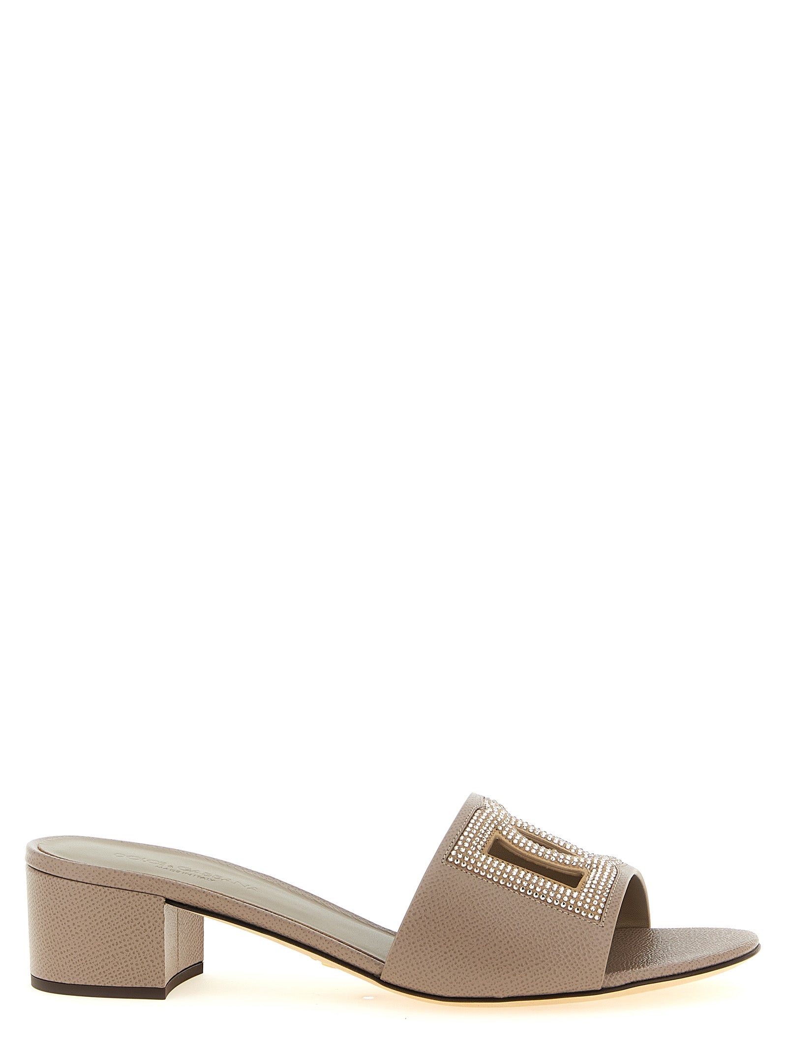 Mules Sandals Flat Shoes by Dolce & Gabbana for women in suede calfskin & goat leather gray & signature showcases a dynamic silhouette, artfully capturing Women's Suede Calfskin & Goat Leather Mules Sandals Flat Shoes through its distinctive and elegant .