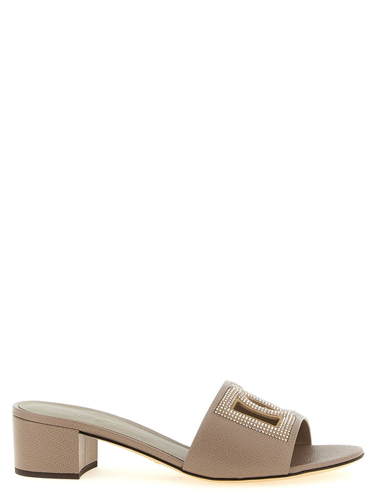 Mules Sandals Flat Shoes by Dolce & Gabbana for women in suede calfskin & goat leather gray & signature showcases a dynamic silhouette, artfully capturing Women's Suede Calfskin & Goat Leather Mules Sandals Flat Shoes through its distinctive and elegant .