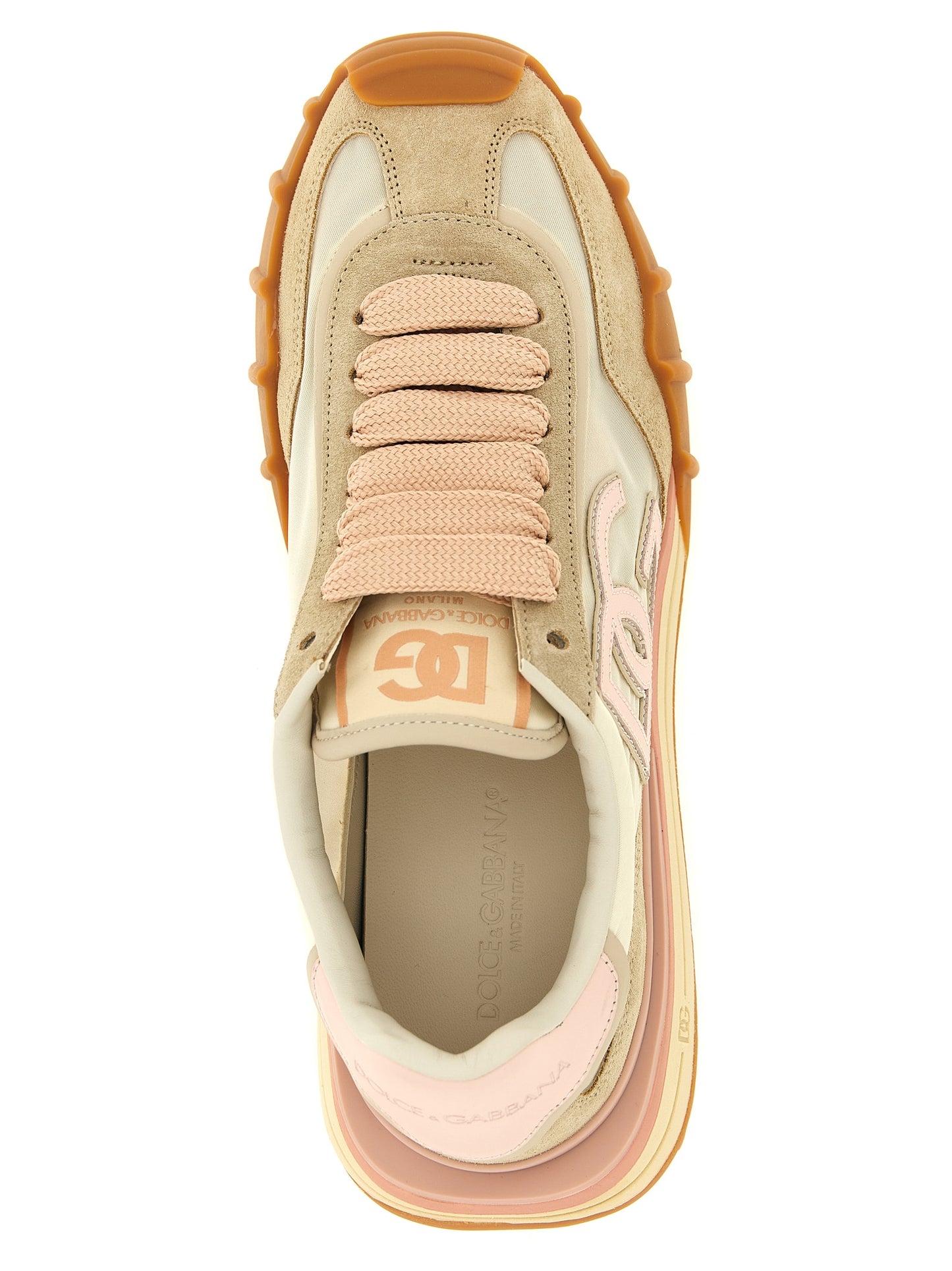 Athletic Sneakers by Dolce & Gabbana for women in suede calf leather & canvas multicolor & pink showcases a architectural silhouette, artfully capturing the essence of the Women's Athletic Suede Calf Leather & Canvas Sneakers with its signature architectural athletic style construction.