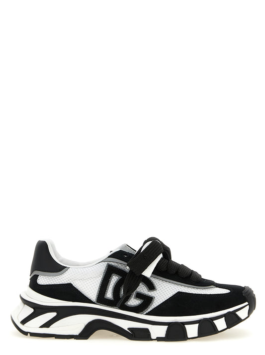 Athletic Sneakers by Dolce & Gabbana for women in tu polyester & suede calf leather bicolour, black & white showcases a architectural silhouette, artfully capturing the essence of the Women's Athletic TU Polyester & Suede Calf Leather Sneakers with its signature architectural athletic style construction.