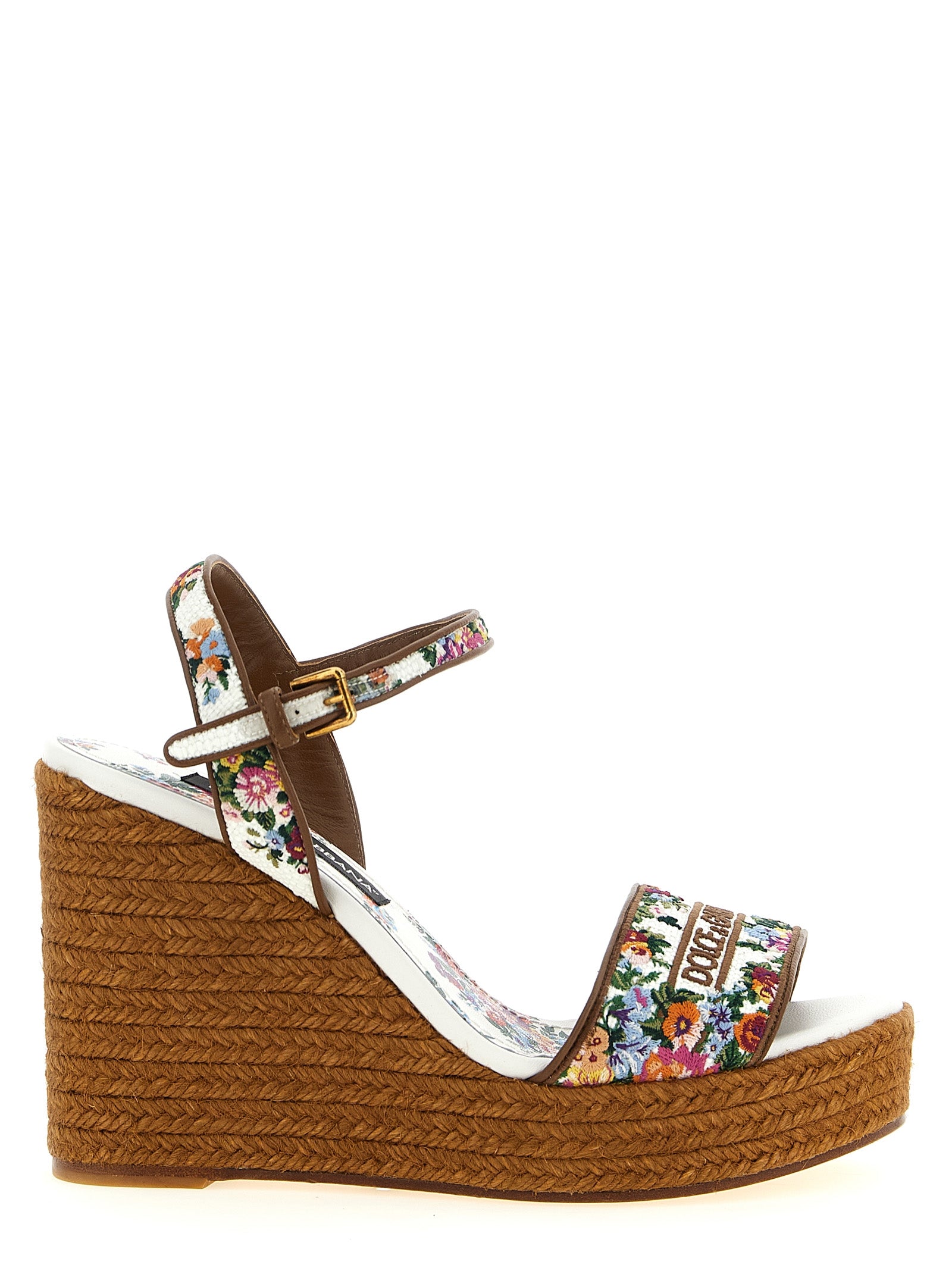 Wedge Ankle Strap Sandals by Dolce & Gabbana for women in tu polyamide leather & cotton multicolor, floral & print features an statuesque Women's TU Polyamide Leather & Cotton Wedge Ankle Strap Sandals silhouette with a refined wedge and elegant .