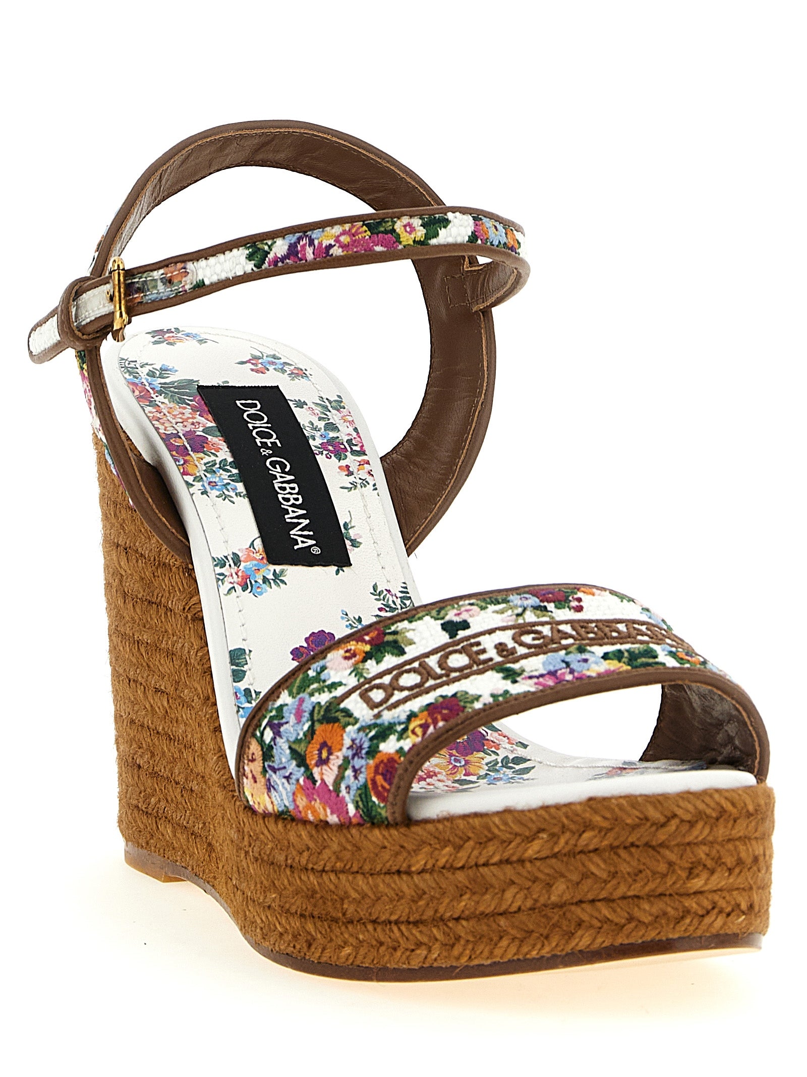 Wedge Ankle Strap Sandals by Dolce & Gabbana for women in tu polyamide leather & cotton multicolor, floral & print features an exquisite silhouette, showcasing the exquisite Women's TU Polyamide Leather & Cotton Wedge Ankle Strap Sandals with a wedge and .