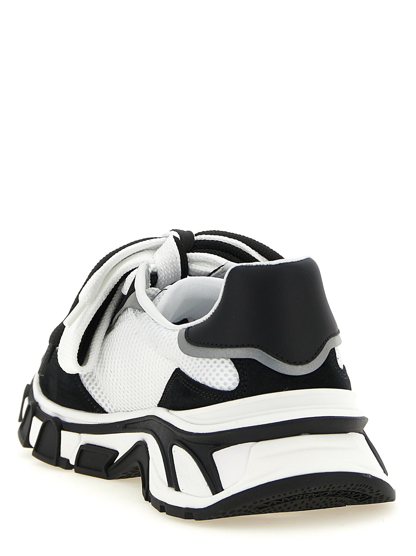 Athletic Sneakers by Dolce & Gabbana for women in tu polyester & suede calf leather bicolour, black & white features an exquisite silhouette, showcasing the premium athletic style of the Women's Athletic TU Polyester & Suede Calf Leather Sneakers with an exquisite finish.
