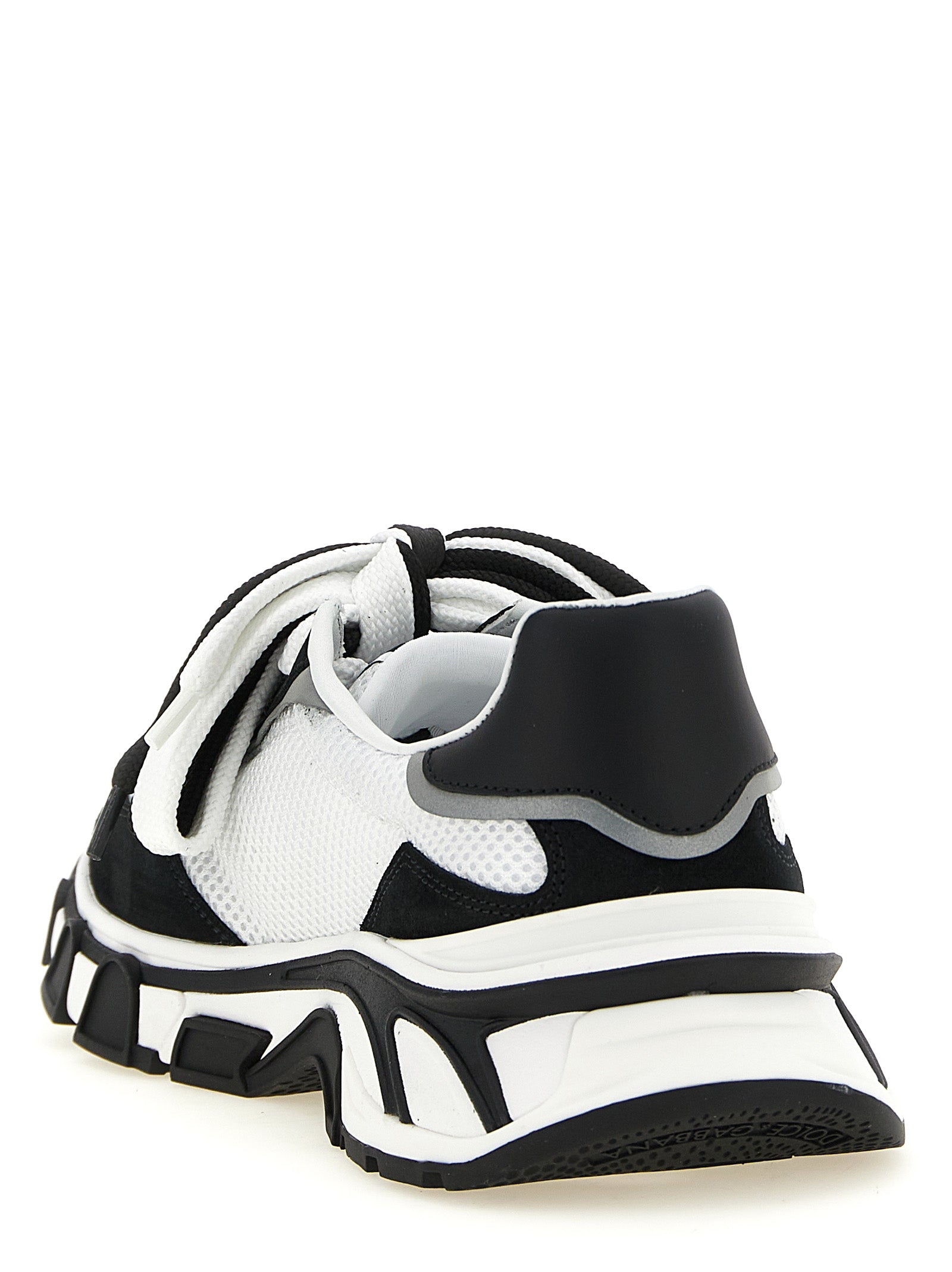 Athletic Sneakers by Dolce & Gabbana for women in tu polyester & suede calf leather bicolour, black & white features an exquisite silhouette, showcasing the premium athletic style of the Women's Athletic TU Polyester & Suede Calf Leather Sneakers with an exquisite finish.