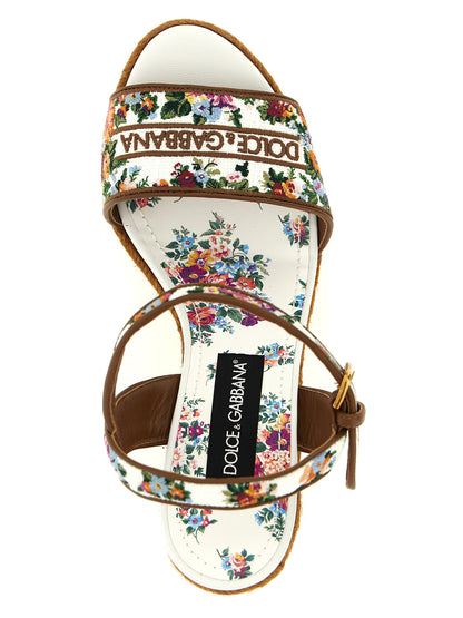 Wedge Ankle Strap Sandals by Dolce & Gabbana for women in tu polyamide leather & cotton and multicolor, floral & print presents a captivating silhouette, showcasing the signature style of the Women's TU Polyamide Leather & Cotton Wedge Ankle Strap Sandals with a captivating wedge and captivating .