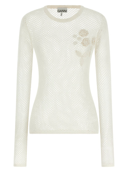 Cardigan by Ganni for women in organic cotton white & floral features an impeccable silhouette, showcasing a sophisticated round neckline and long-sleeve detail for a truly impeccable finish.