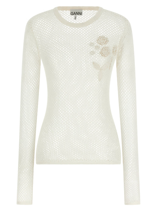 Cardigan by Ganni for women in organic cotton white & floral features an impeccable silhouette, showcasing a sophisticated round neckline and long-sleeve detail for a truly impeccable finish.