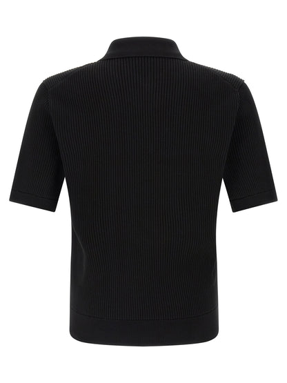 Polo Shirt by Dolce & Gabbana for men in cotton black showcases a sharp silhouette, detailed with a refined and sharp for a sophisticated finish.