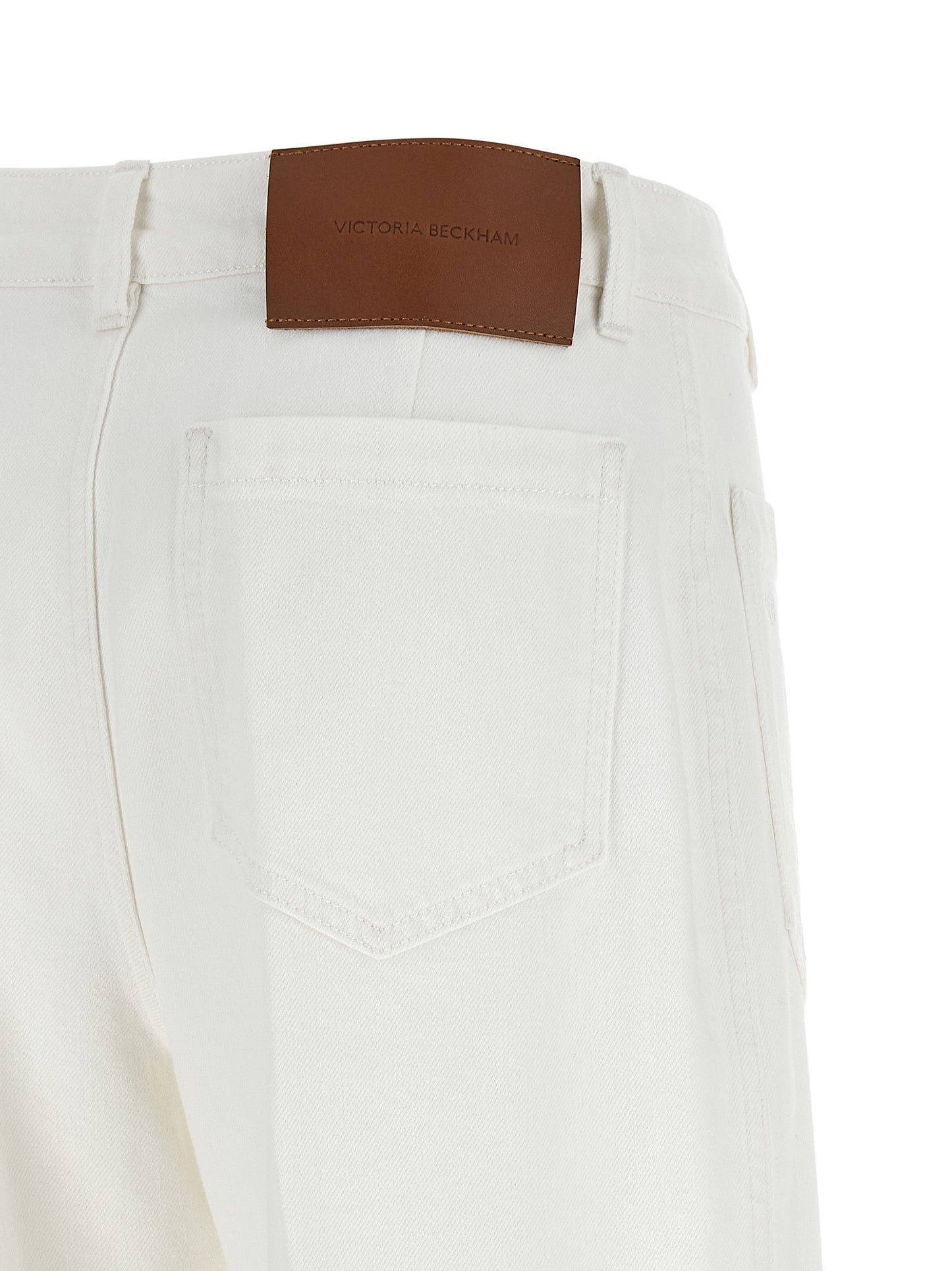 Jeans by Victoria Beckham for women in stretch denim cotton white presents a refined pantology silhouette, artfully defined by a refined pantology flared & wide, long, and a sophisticated high rise.