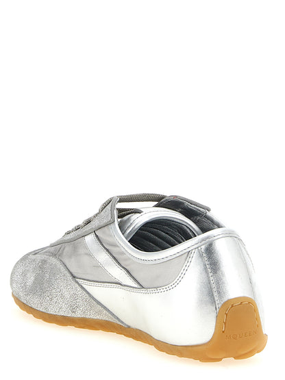 Athletic Sneakers by Alexander McQueen for women in nylon leather silver showcases an impeccable silhouette, defined by an impeccable athletic style design that perfectly captures the essence of the Women's Athletic Nylon Leather Sneakers.