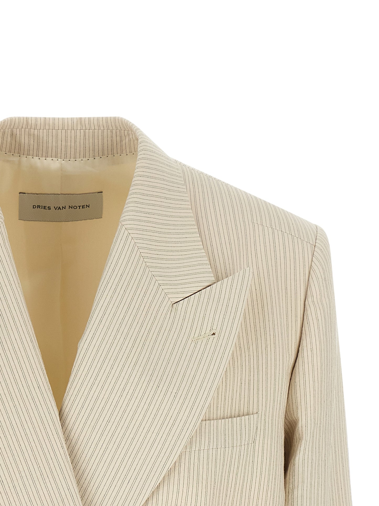 This Blazer by Dries Van Noten for women in cotton beige, horn & striped presents a tailored silhouette, meticulously tailored with a tailored and distinctive for a tailored finish.