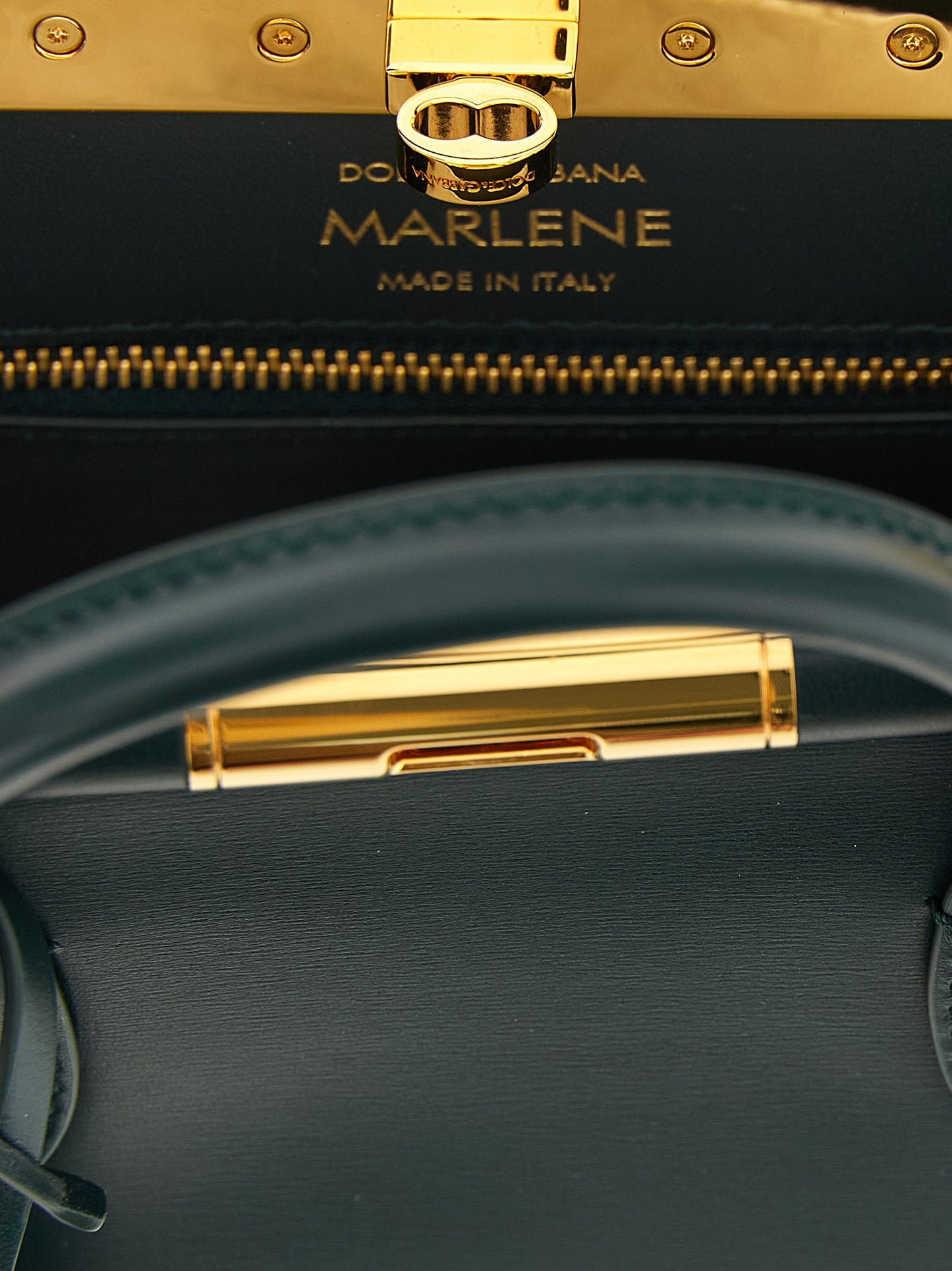 Mini Evening Handbag by Dolce & Gabbana for women in zamak calf leather & brass bicolour & green features a contemporary silhouette, showcasing a secure , ample , and contemporary shoulder-strap & handle for a sophisticated look.