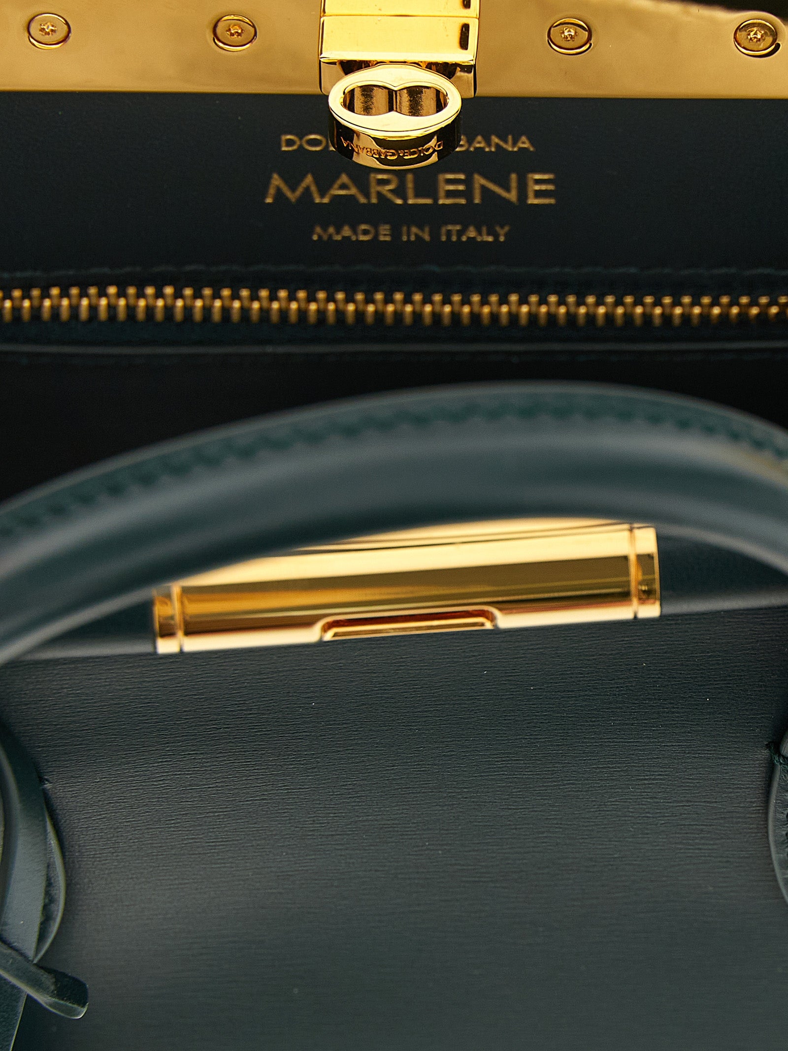 Mini Evening Handbag by Dolce & Gabbana for women in zamak calf leather & brass bicolour & green features a contemporary silhouette, showcasing a secure , ample , and contemporary shoulder-strap & handle for a sophisticated look.