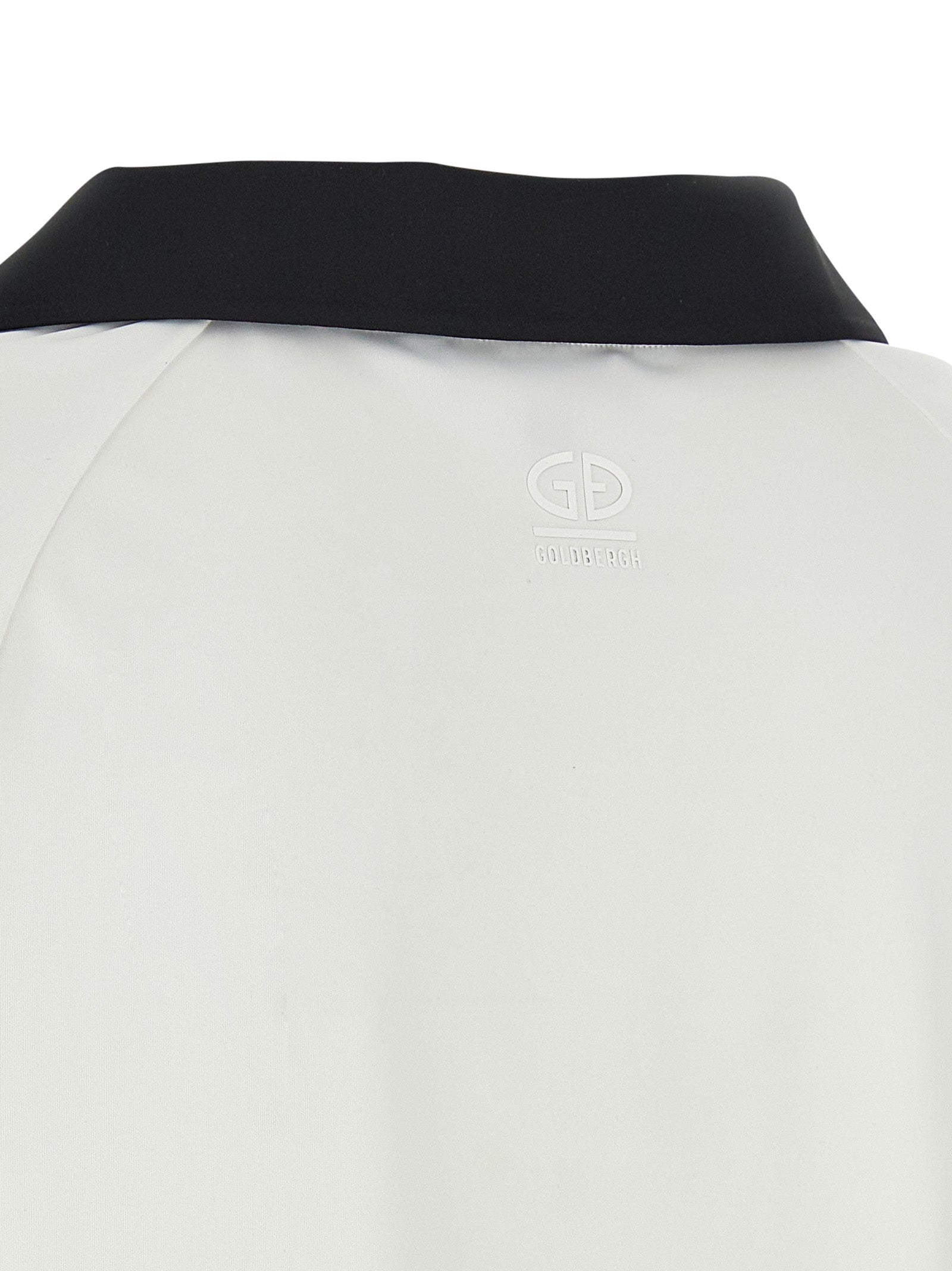 Polo Shirt by GOLDBERGH for women in stretch polyester bicolour, black & white showcases a enviable silhouette, featuring a refined and for a enviable finish.