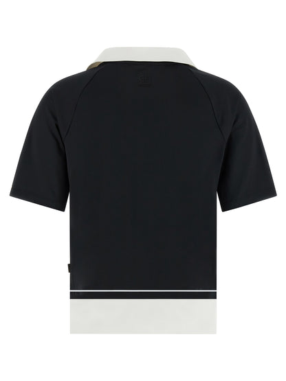 Polo Shirt by GOLDBERGH for women in stretch polyester bicolour, black & white showcases a sharp silhouette, detailed with a refined and sharp for a sophisticated finish.
