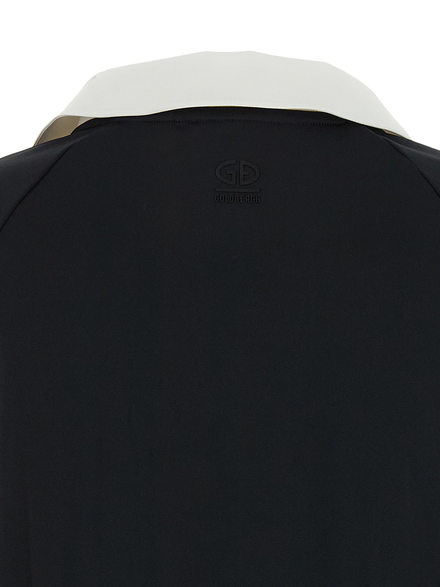 Polo Shirt by GOLDBERGH for women in stretch polyester bicolour, black & white showcases a sharp silhouette, detailed with a refined and sharp for a sophisticated finish.