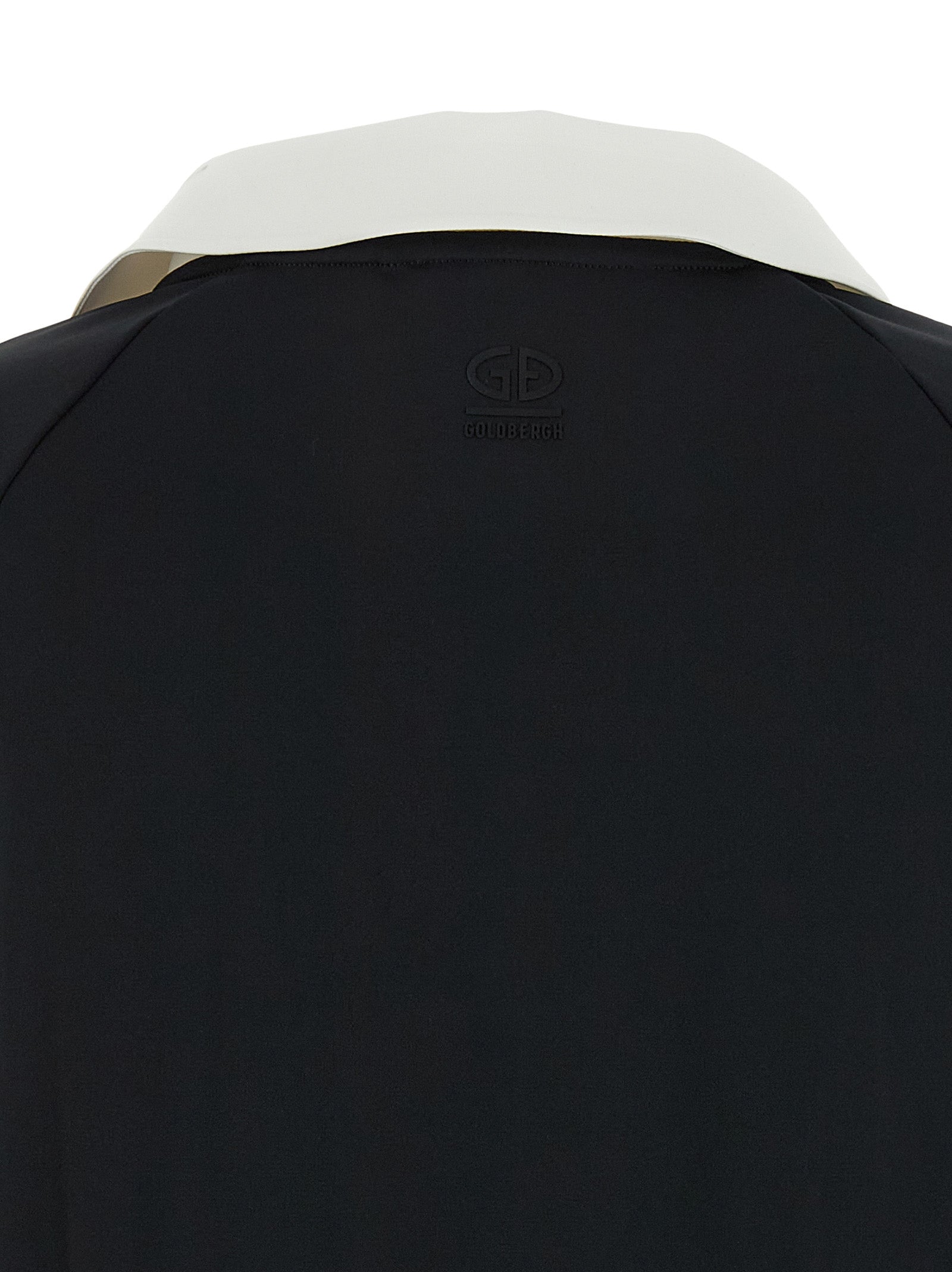 Polo Shirt by GOLDBERGH for women in stretch polyester bicolour, black & white showcases a sharp silhouette, detailed with a refined and sharp for a sophisticated finish.