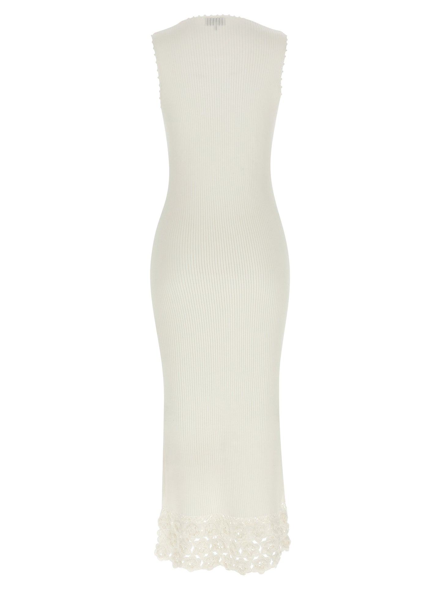 Dress by Ganni for women in organic cotton & polyamide white features an cute silhouette, detailed with a and v-neck neckline that elegantly flows into a cute long.