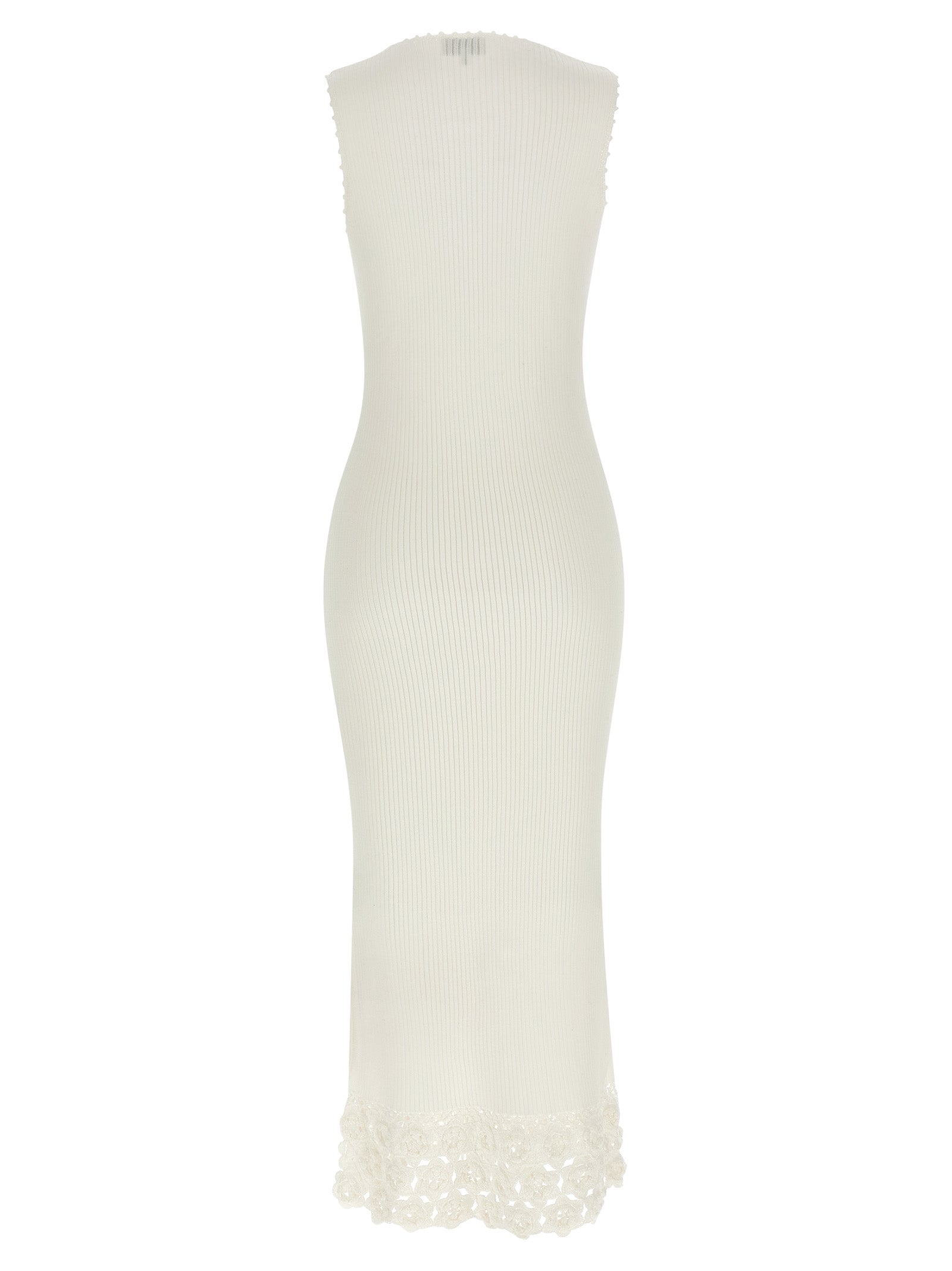 Dress by Ganni for women in organic cotton & polyamide white features an cute silhouette, detailed with a and v-neck neckline that elegantly flows into a cute long.