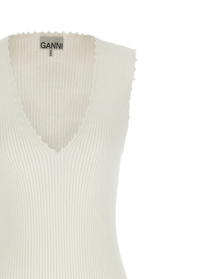 Dress by Ganni for women in organic cotton & polyamide white features an eye catching silhouette with a sophisticated v-neck neckline, elegant , and a refined long for a eye catching aesthetic.