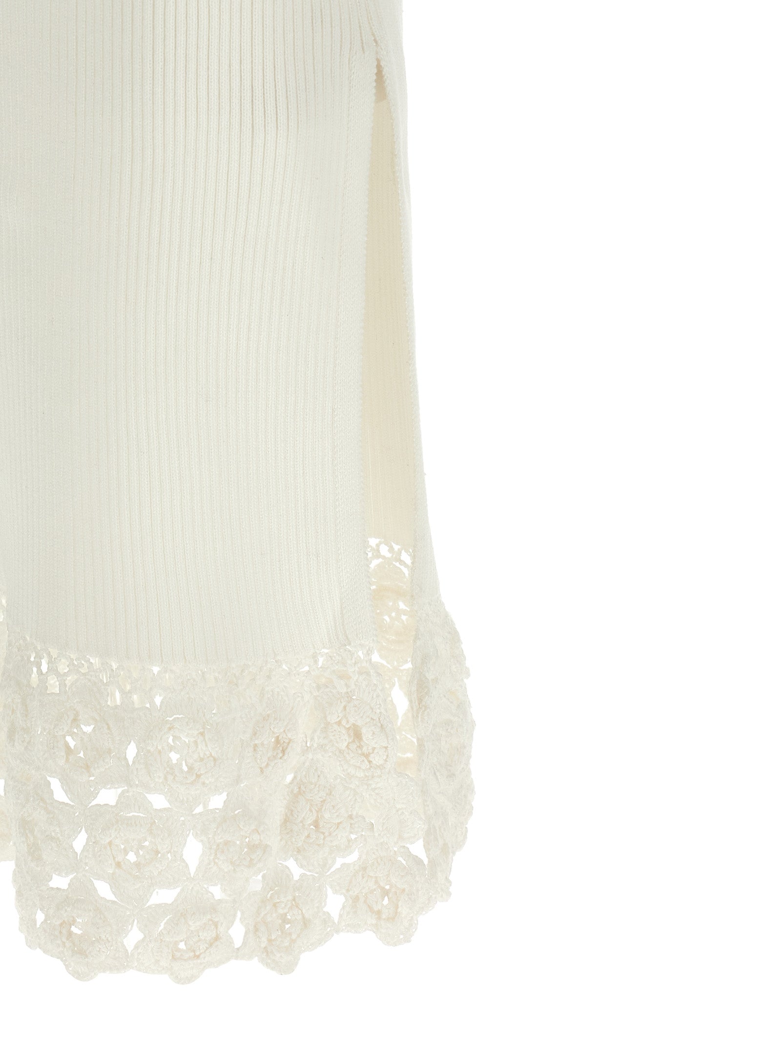 Dress by Ganni for women in organic cotton & polyamide white features an magnificent silhouette, artfully detailed with a magnificent and that flows into an magnificent long.