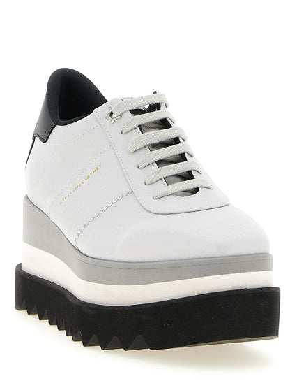 Platform Wedge Lace-Up Sandals by Stella McCartney for women in polyethylene & polyurethane gray presents a sculptural silhouette, showcasing the Women's Polyethylene & Polyurethane Platform Wedge Lace-Up Sandals design with a sculptural platform wedge and for a premium look.