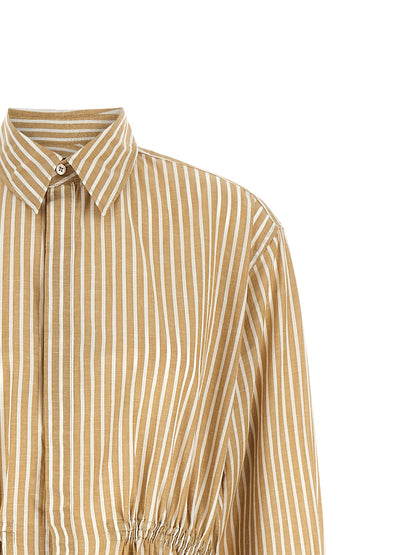 Dress by Polo Ralph Lauren for women in linen & cotton beige & striped features an sultry silhouette defined by a and , falling to an sultry midi for a sultry look.