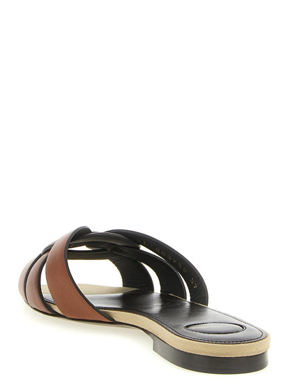 Mules Sliders Flat Shoes by Saint Laurent for women in calfskin leather brown showcases a enchanting silhouette as part of the Women's Calfskin Leather Mules Sliders Flat Shoes collection, defined by a enchanting square toe style and for a enchanting look.