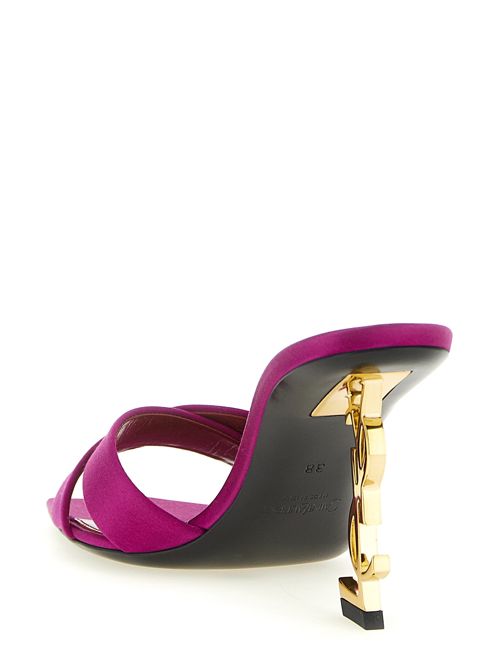 Stiletto Mules Sandals by Saint Laurent for women in viscose silk satin & leather fuchsia showcases a sculptural silhouette as Cassandre Women's Viscose Silk Satin & Leather Stiletto Mules Sandals, defined by a sculptural stiletto and sculptural for a sculptural look.