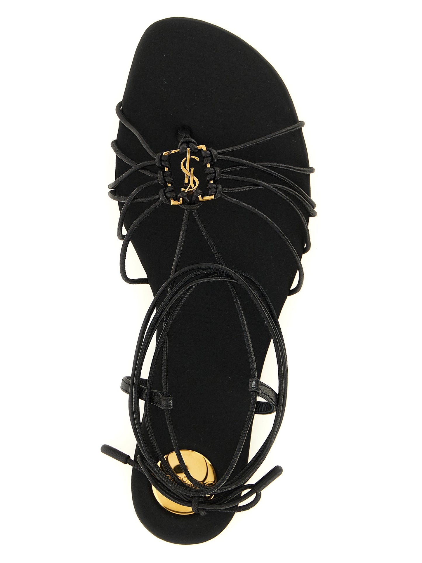Flat Sandals by Saint Laurent for women in lamb leather and black presents a captivating silhouette, showcasing the signature style of the Cassandre Women's Lamb Leather Flat Sandals with a captivating flat and captivating almond toe style.