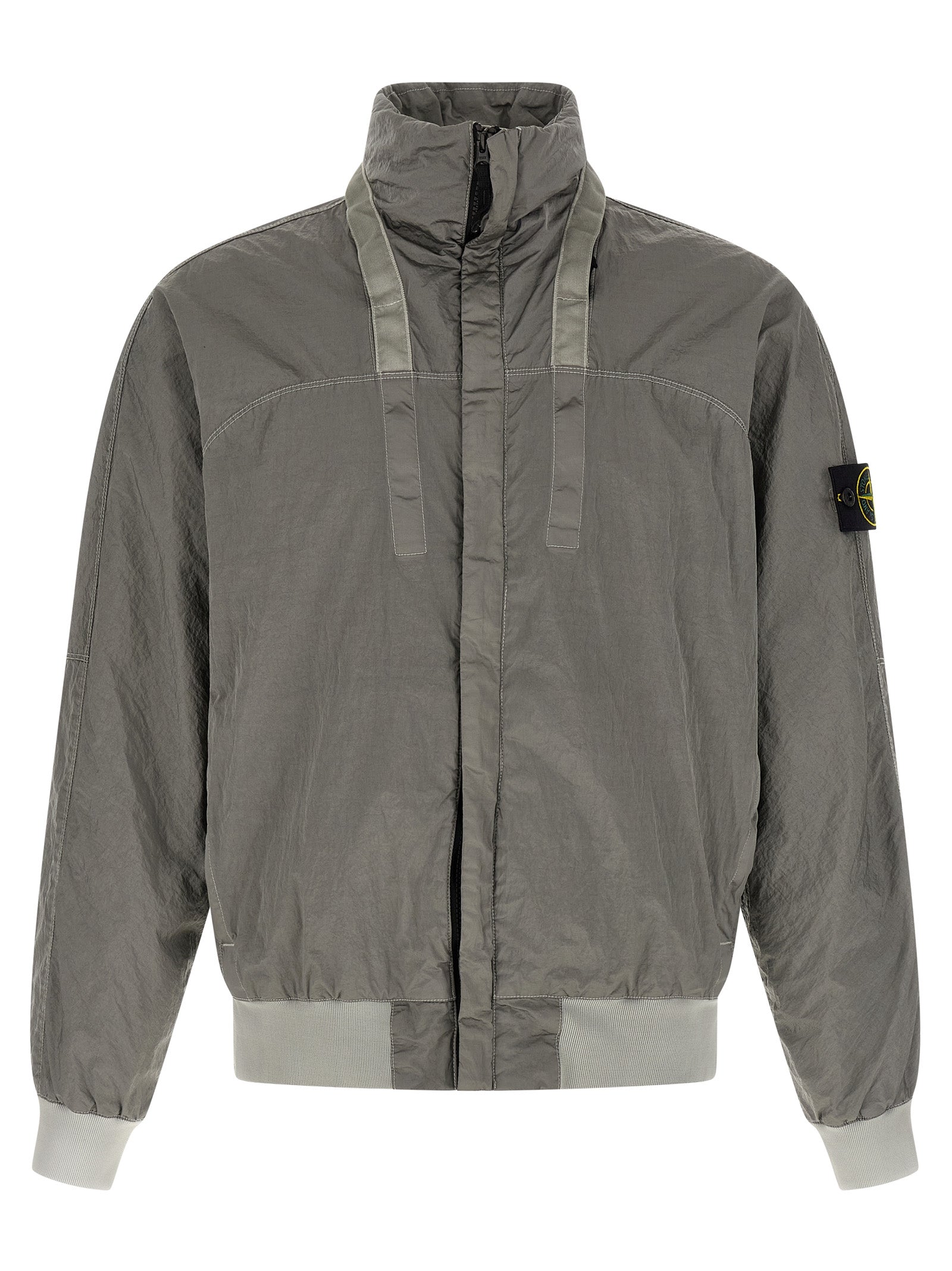 This Hooded Bomber Jacket by Stone Island for men in nylon gray exhibits a edgy silhouette, meticulously detailed with functional hooded and a edgy hooded neckline for a edgy finish.