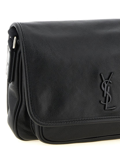 Small Crossbody Messenger Bag by Saint Laurent for men in calfskin leather black features a artisanal Cassandre Essence Niki Calfskin Leather Small Crossbody Messenger Bag design with a secure flap & magnetic, ample , and versatile crossbody-strap, shoulder-strap & adjustable-strap for a artisanal finish.