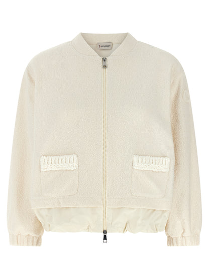 Cardigan by Moncler for women in nylon polyester & wool white features an crisp silhouette, showcasing a sophisticated high-neck neckline and long-sleeve detail for a truly crisp finish.