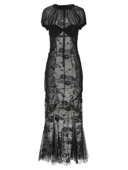 Dress by The Attico for women in polyamide cotton black features a dramatic silhouette, showcasing an elegant high-neck neckline and that flows into a dramatic midi short.