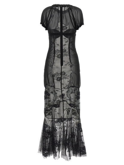 Dress by The Attico for women in polyamide cotton black features an magnificent silhouette, artfully detailed with a magnificent high-neck neckline and that flows into an magnificent midi short.