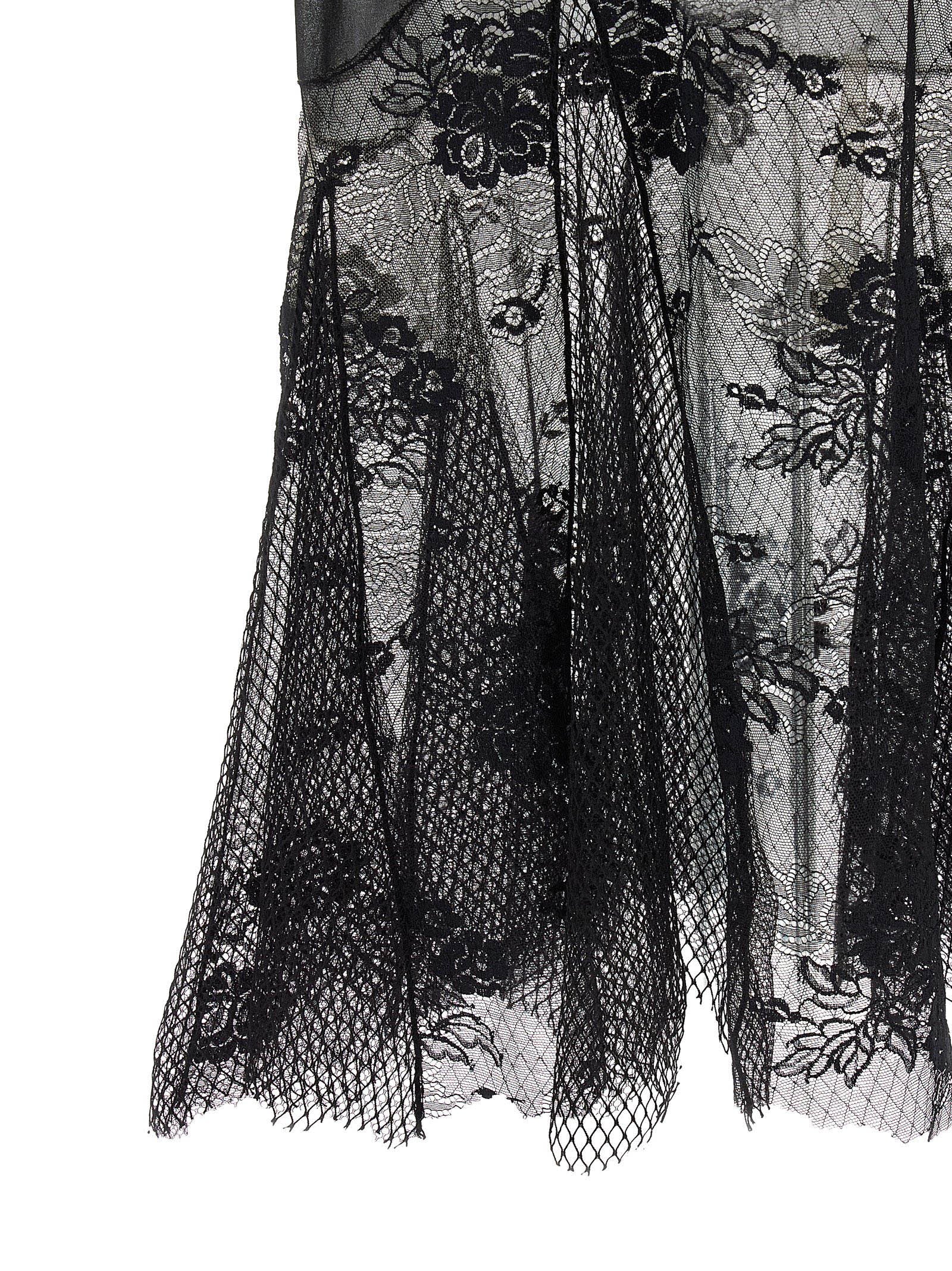 Dress by The Attico for women in polyamide cotton black showcases a striking silhouette, elegantly detailed with a , refined , and a striking midi short for a striking finish.