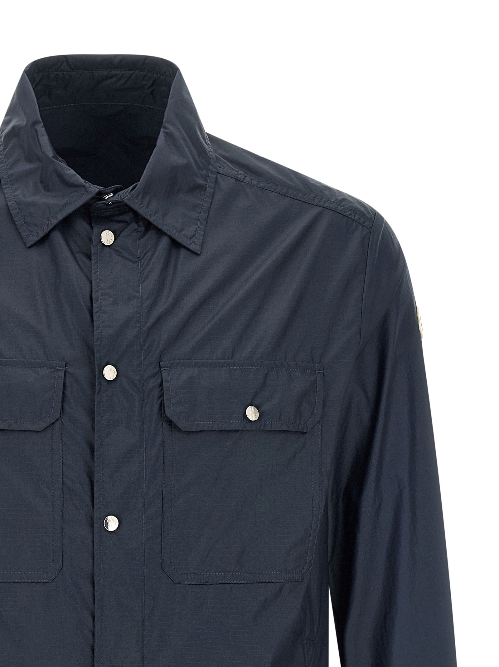 Shirt by Moncler for men in nylon felt blue & transparent showcases a sharp silhouette, elegantly detailed with a sharp and sharp .