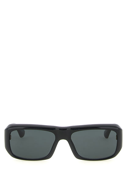 Sunglasses by Saint Laurent for men in silicone resin & acetate black showcases a ethereal silhouette, featuring black coloured frame with for a ethereal finish.